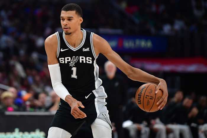 San Antonio Spurs center Victor Wembanyama controls the ball